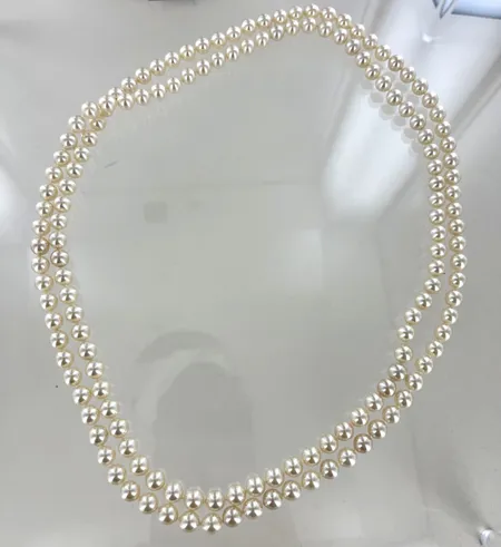 Pärlhalsband syntetiska längd 100 cm bredd 7 mm