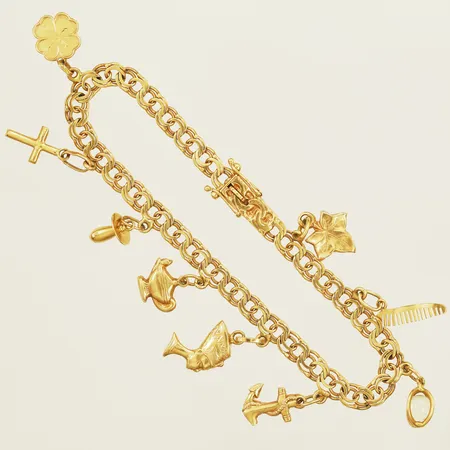 Armband Bismarck med nio berlocker 19cm bredd 4,7mm tillverkad år 1968 18K Vikt: 12,8 g
