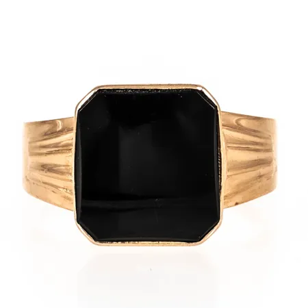 Klackring med svart sten troligen onyx stl:21½ bredd 3-13,5mm, något repig sten, 18K 3,8g.