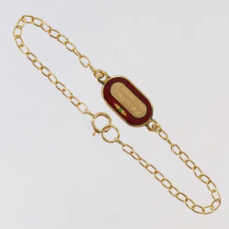 Armand med berlock emaljdekor längd 13,5cm, bredd ca 2-8mm, 18K Vikt: 1,7 g