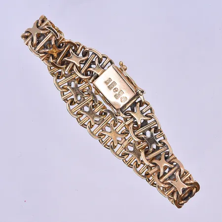Armband X-länk längd 18,5 cm, bredd 11 mm 18K. Vikt: 34,4 g