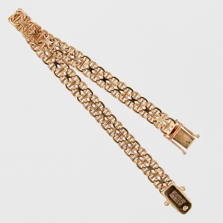 Armband x-länk med stav N S E Guldvaru Aktiebolag 1973, längd ca 19cm bredd ca 7mm, 18K Vikt: 15,1 g