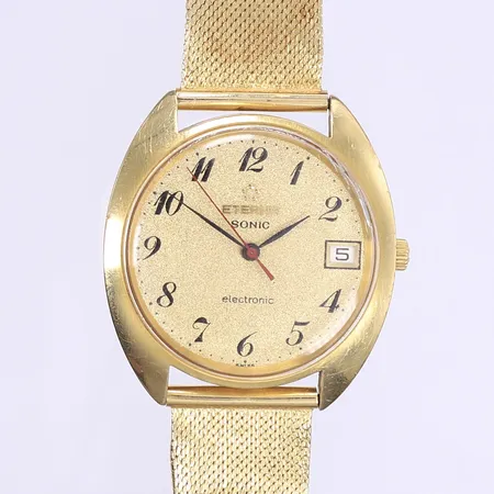 Herrur Eterna Sonic Electronic Ø36mm, stämgaffel, cal. 1550, boettnummer 749T, 18K i boett och länk, länk ej original, bucklig, sliten boett, går ej ej funktionstestad, Bruttovikt: 74,8g