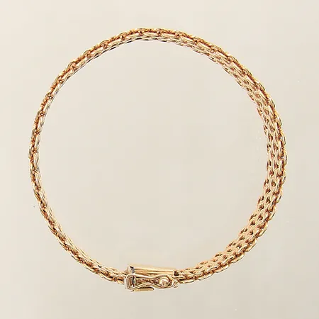 Armband X-länk längd 19,5cm bredd16,7mm ostämplad 18K  Vikt: 55,8 g
