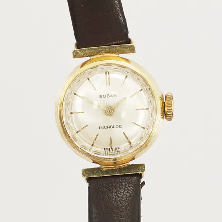 Damur Sober manuell Ø18mm, boett i 18K läderarmband, slitet spänne i förgylld metall
