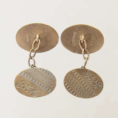Ett par manschettknappar 17x12mm gravyr 9K  Vikt: 3,1 g