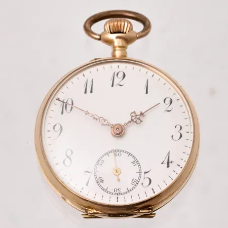 Fickur i 14K guld med innerboett i metall, Ø29,7mm, boettnr 8172, bucklig, repor i glas, bruttovikt 21,43g.