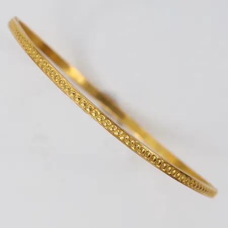 Armring med mönsterdekor Ø61mm, bredd 2,5mm, skev, 21K Vikt: 11,5 g