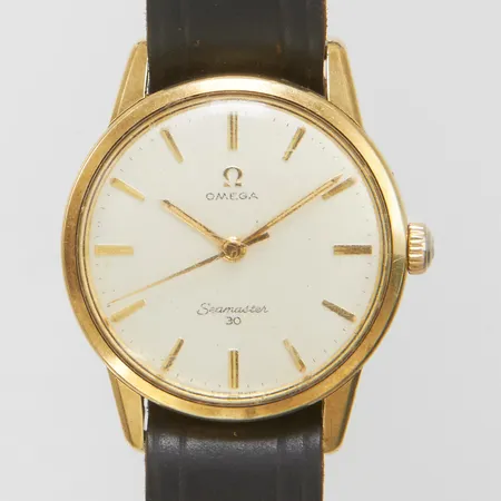 Herrur Omega Seamaster manuel, guld på stål Ø35mm, boettnr 14390-61-SG, verknr 20466074, cal.285, slitet läderband ej original, repigt glas, inga tillbehör