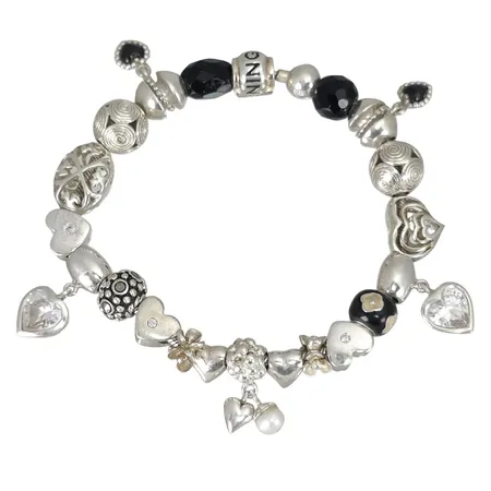 Armband med berlocker "Spinning" silver 925/1000 Italien, längd 19 cm, bredd 2 - 10,5 mm Vikt: 40,9 g