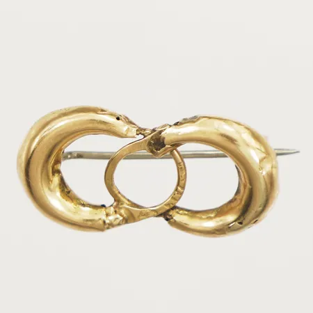 Brosch i form av omarbetade örhängen längd 33mm, nål ej i guld defekt 14K Vikt: 3,1 g