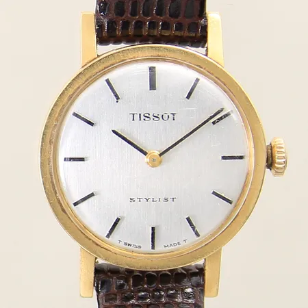 Damur Tissot Stylist 18K manuell Ø24mm läderband ej original med doubléspänne trög krona repigt glas/boett inga tillbehör