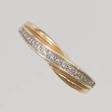 Ring diamanter 15x ca 0,0025ct stl:17½ bredd 4mm 18K 2,7g.