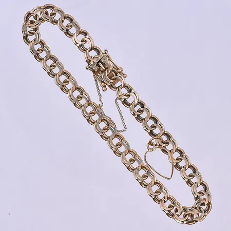 Armband Bismarck med en berlock längd 18,5 cm, bredd 6 mm 18K. Vikt: 11,8 g