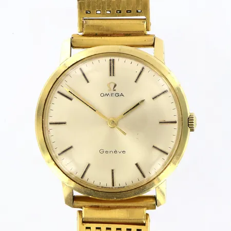 Herrur Omega Genéve manuell Ø33mm stållänk 18,5cm, stel länk, färgbortfall, gravyr, boett i 18K Vikt: 0 g