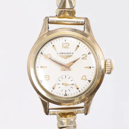 Damur Longines Ø24mm manuell uppdragning, va 1950/60-tal, guld på stål, guldfärgad flexlänk, glas med repor 