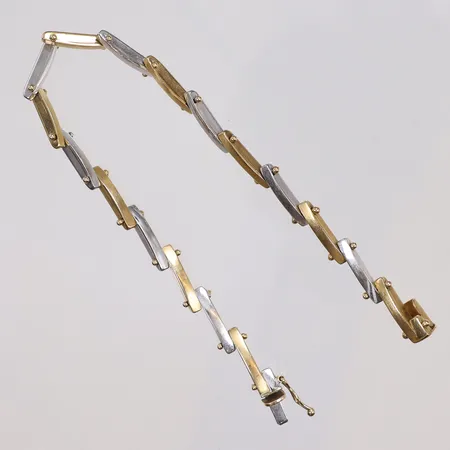 Armband, längd 19,5cm, bredd 2-7mm, rödguld/vitguld, 18K Vikt: 10,6 g
