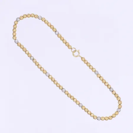 Armband med kulor längd 18,5cm bredd 2mm tvåfärgat 18K Vikt: 3 g