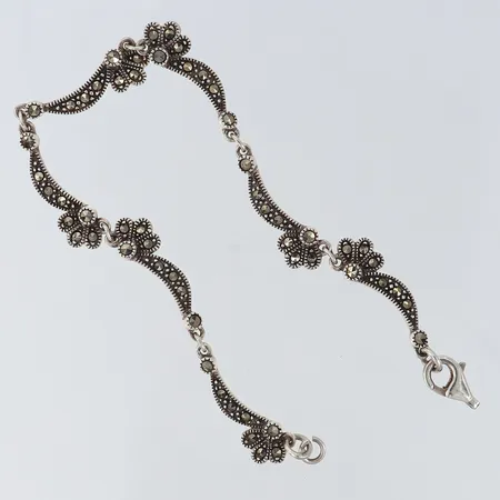 Armband med markasiter längd 17,5cm bredd 7,5mm GHA defekt lås Silver 925/1000.  Vikt: 7,6 g