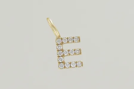 Hänge med diamanter E från Cravingfor längd 1 cm 18K . Brillantslipade naturliga vita diamanter i TW/SI-kvalitetUngefär 0,1 karat diamanter. Nypris 6595kr Vikt: 0 g