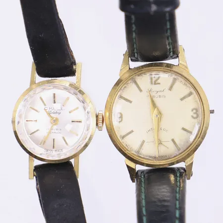 2 Damur omkring 1950-60-tal Royal och Skull defekta går ej svart läderband boett i 18K ca 10g guld