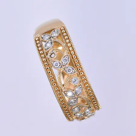 Ring med diamanter 19x0,01ct Guldfynd stl:19¼, bredd 3-8 mm 18K. Vikt: 4,8 g