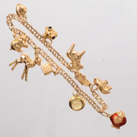 Armband Bismarck 19cm, bredd 3,7mm, 9 berlocker, Sv Guldvarubolaget Trygve Berghma, år 1956, kistlås, 18K Vikt: 13,7 g