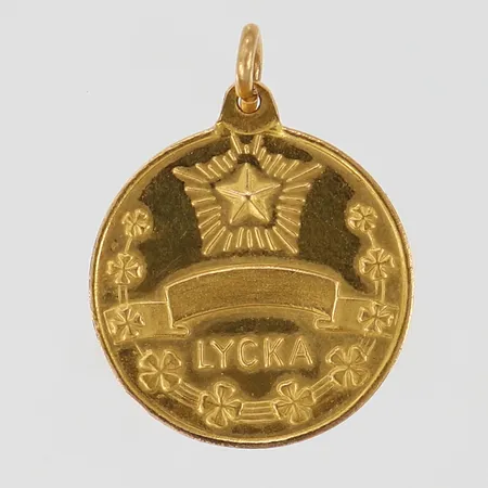 Hänge lycka längd inkl ögla ca 20mm, bredd ca 15mm, Sporr år 1984, 18K Vikt: 2,2 g