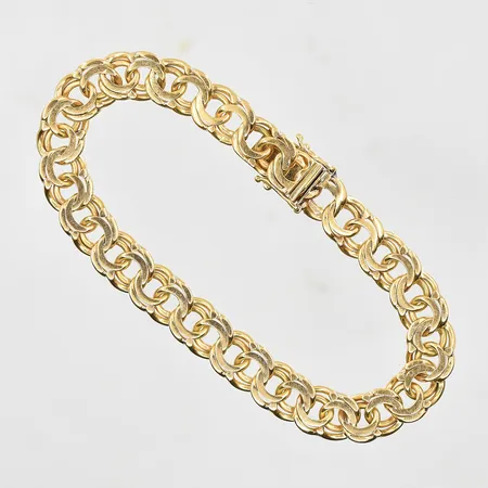 Armband Bismarck längd 19 cm, bredd 8 mm, 18K. Vikt: 24 g