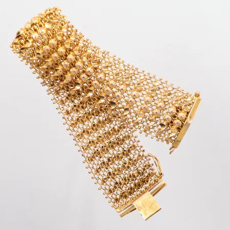 Armband längd 18cm, bredd 25,3mm, ojämnheter, saknar låskedja, 18K Vikt: 30,7 g