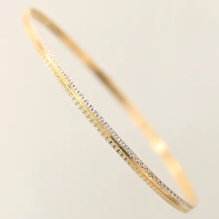 Armring Ø61mm bredd 3mm vitguldsdetaljer ostämplad 18K  Vikt: 6,5 g