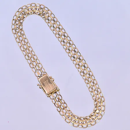 Armband X-länk längd 20 cm, bredd 7 mm 18K. Vikt: 9,7 g