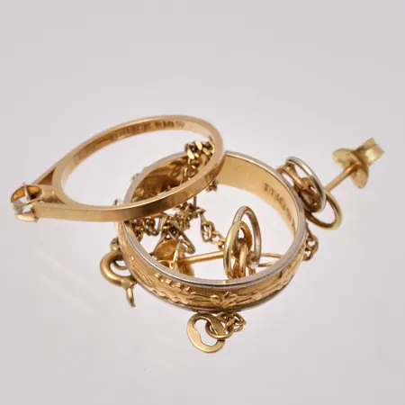 Diverse defekt guld, 18K, 10,16g.