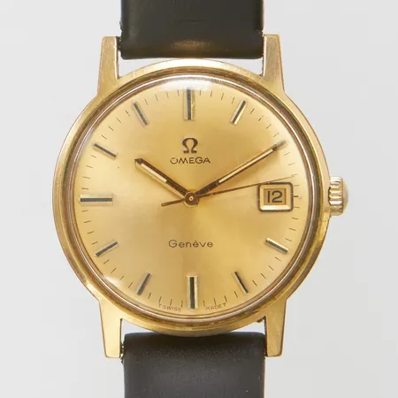 Herrur Omega Genève Ø35mm, manuell, datum, guld på stål, boettnr 136.070, verknr 29238571, cal.513, från 1969, läderband ej original, repig bakboett, mindre repor på glas, inga tillbehör