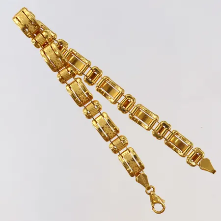 Armband längd 19,5cm bredd 8mm 22K Vikt: 16,5 g