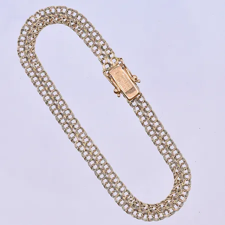 Armband Bismarck längd 18,5 cm, bredd 6 mm 18K. Vikt: 6,2 g
