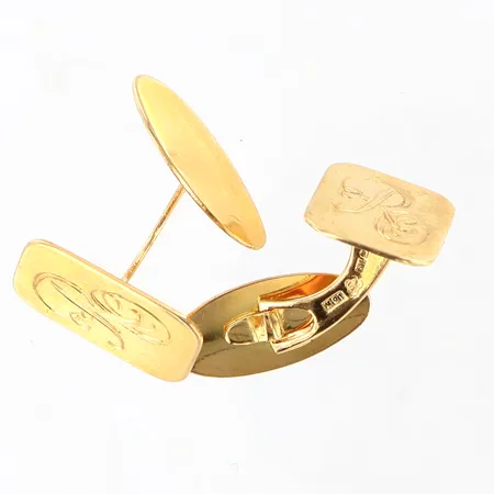 Ett par manschettknappar monogram 18x12mm 18K. Vikt: 8,7 g