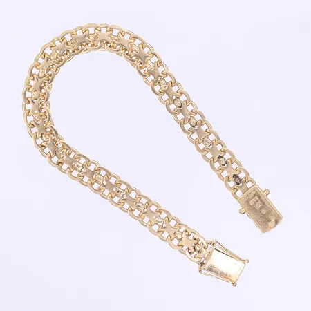 Armband X-länk H Michelsson Guldsmed Stockholm 1966 längd 19,5cm bredd 9mm kraftigt slitage 18K Vikt: 25,2 g