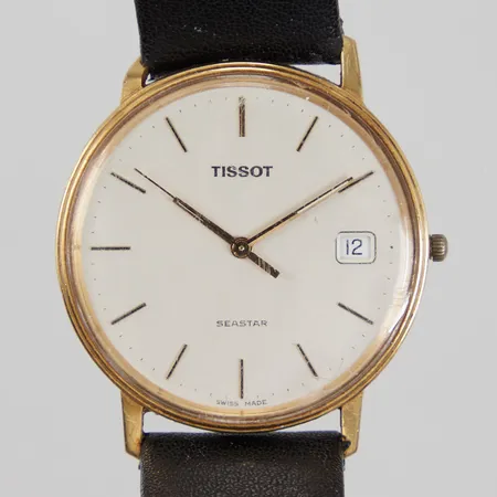 Herrur Tissot Seastar 18K, kvarts, Ø33,5mm, läderband, längd 26,5cm, spänne i doublé, gravyr, skevt horn, repigt glas, krona ej original.