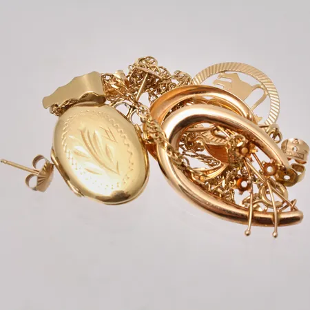 Diverse defekt guld, 18K, 11,19g.