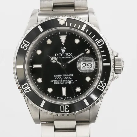 Herrur Rolex Oyster Perpetual Submariner Date, stål, automatisk, 40mm, refnr 16610, snr X864829, cal 3135, verknr 6920112, cirka år 1991, färgbortfall på ring, oysterlänk i stål med repor, kvittokopia, inga tillbehör
