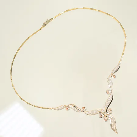 Halscollier tvåfärgad med vita stenar, längd 42cm bredd 2-38mm, 14K 19,4g totalt.