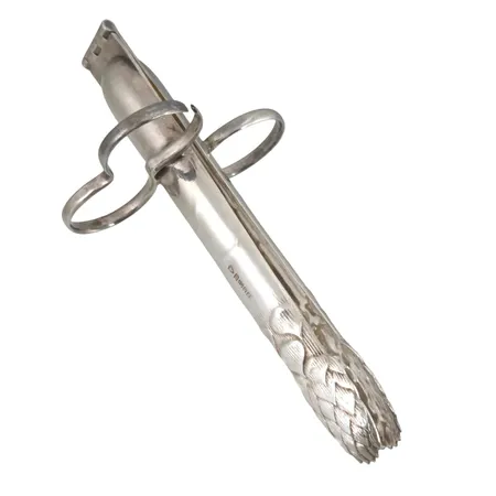 Antik Sparristång nysilver (EP - Electroplate), fina stämplar, längd 12 cm, bristning på ett av handtagen (påverkar ej funktion), fint skick för övrigt, vikt omkring 40 gram Vikt: 40 g
