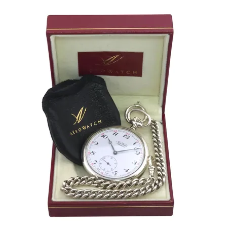 Fickur Aero Watch, silver 925/1000, Ø50 mm, manuell, graverad boett, originaletui, försilvrad klockkedja medföljer, 76,3g