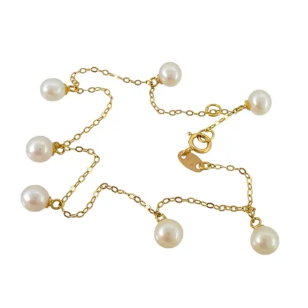 Armband, 18K guld, Odlade Pärlor Ø 5 mm, god lyster, längd 17,0 - 18,5 cm, bredd 1,2 mm, fint skick Vikt: 2,3 g