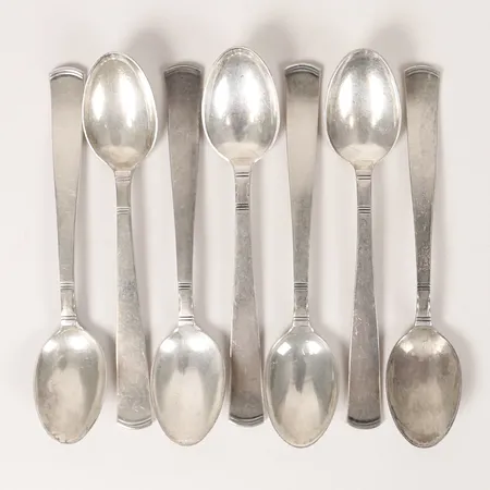 Sju skedar modell Rosenholm längd 12cm, GAB, silver 830/1000 Vikt: 110,9 g