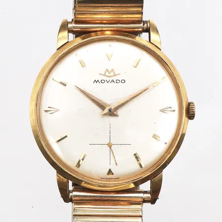 Herrur Movado, 18K, Ø35mm, flexiband i förgylld metall, manuell, gravyr, i service behov, repigt glas, inga tillbehör.