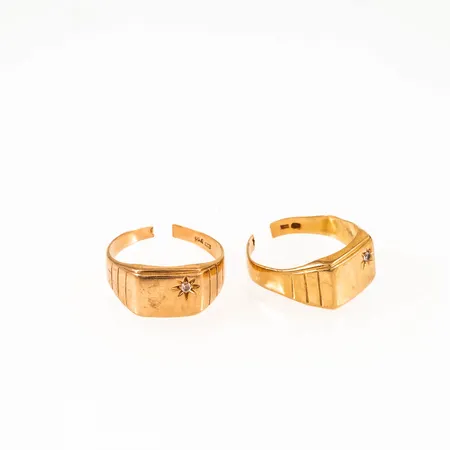 Två klackringar uppklippta, 18K 8,8g. 