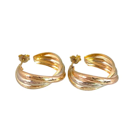 Örhängen Creoler i 18K guld, trefärgad mönstrad modell, diameter 22 mm, bredd 3,3 - 8,5 mm, fint skick Vikt: 4,2 g