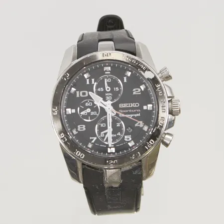Herrur Seiko Sportura, stål, quartz, ref: 7T62-OLCO, srn: 247884, kronograf, skadad ring, slitet band, inga tillbehör.